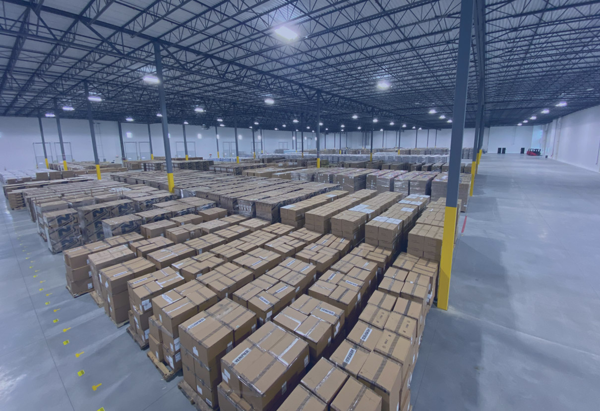 A clean, spacious NOVO Logistics dedicated warehouse facility configured for a specific client's operations.