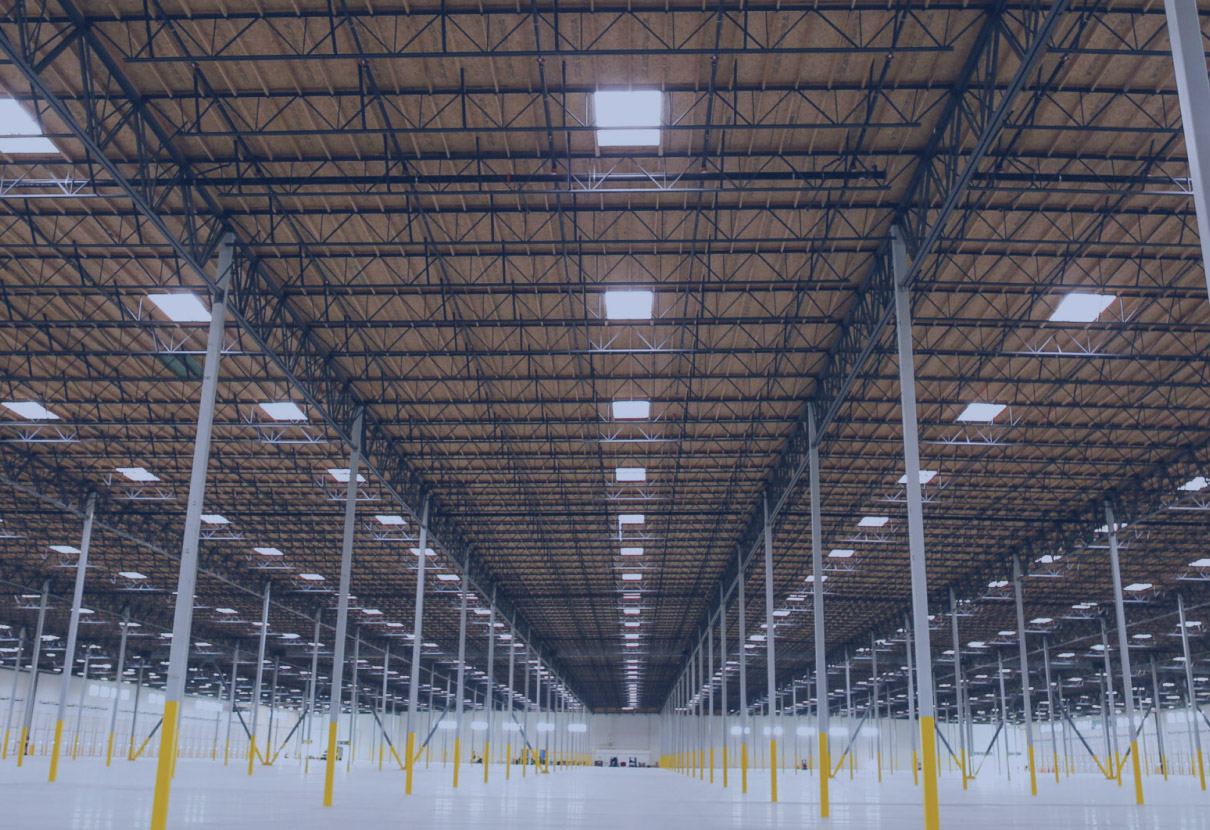 A well-organized NOVO Logistics shared warehouse facility with diverse client inventory.